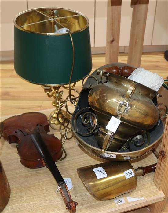 A brass hanging oil lamp, a table lamp and a coal scuttle